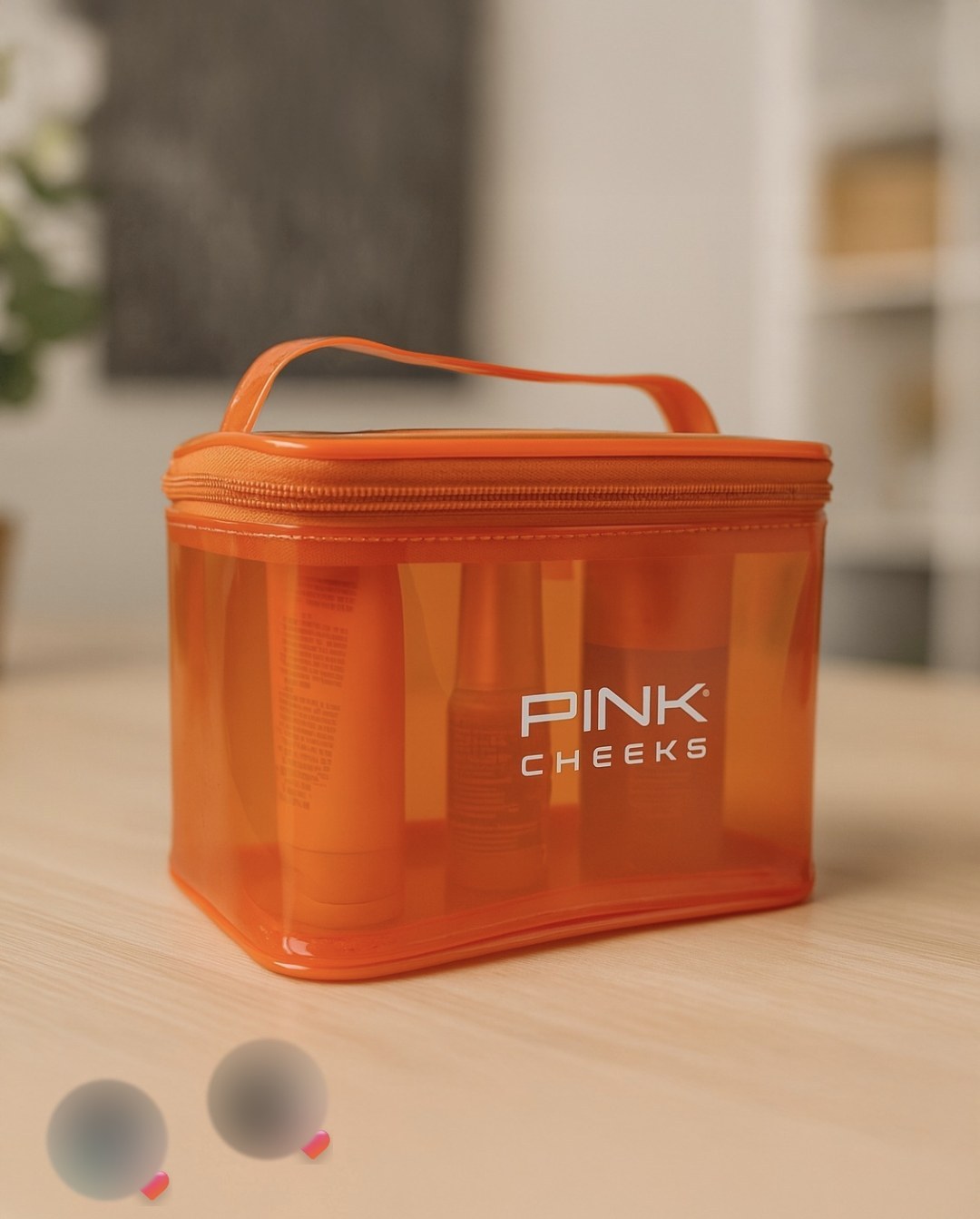 Post da ATO: necessaire laranja em PVC translúcido com produtos Pink Cheeks